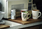 Three Mugs And A Can